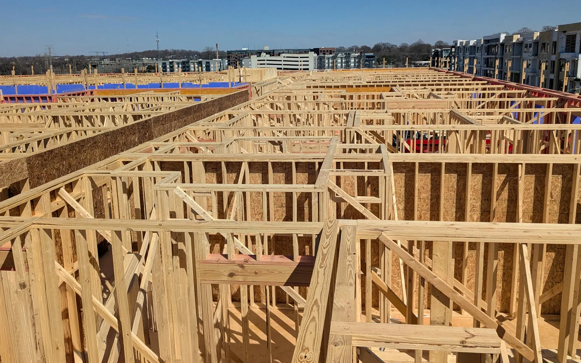 Timber frame in residential construction showing wall assembly with insulation layers 