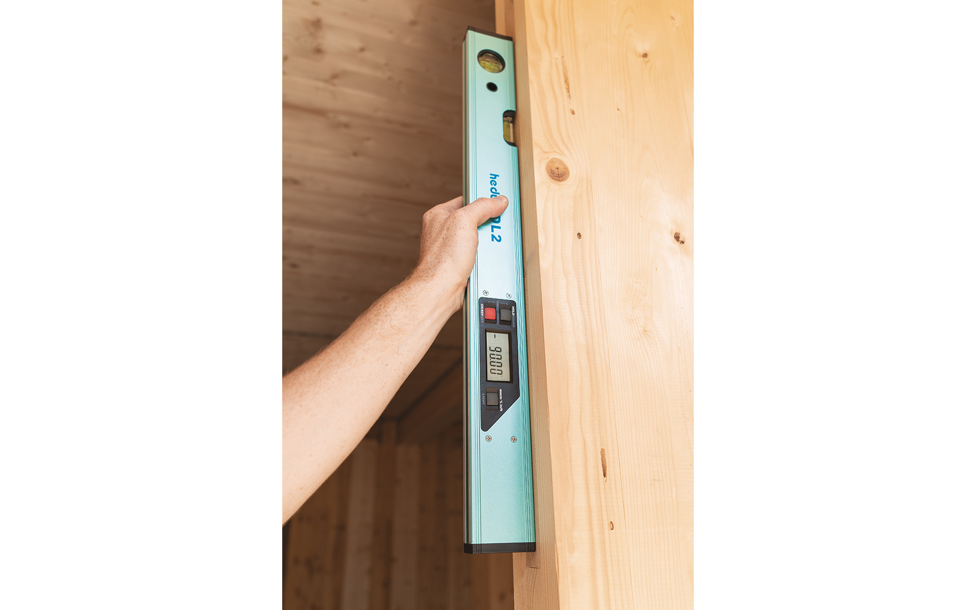 HERON spirit level on timber background 
