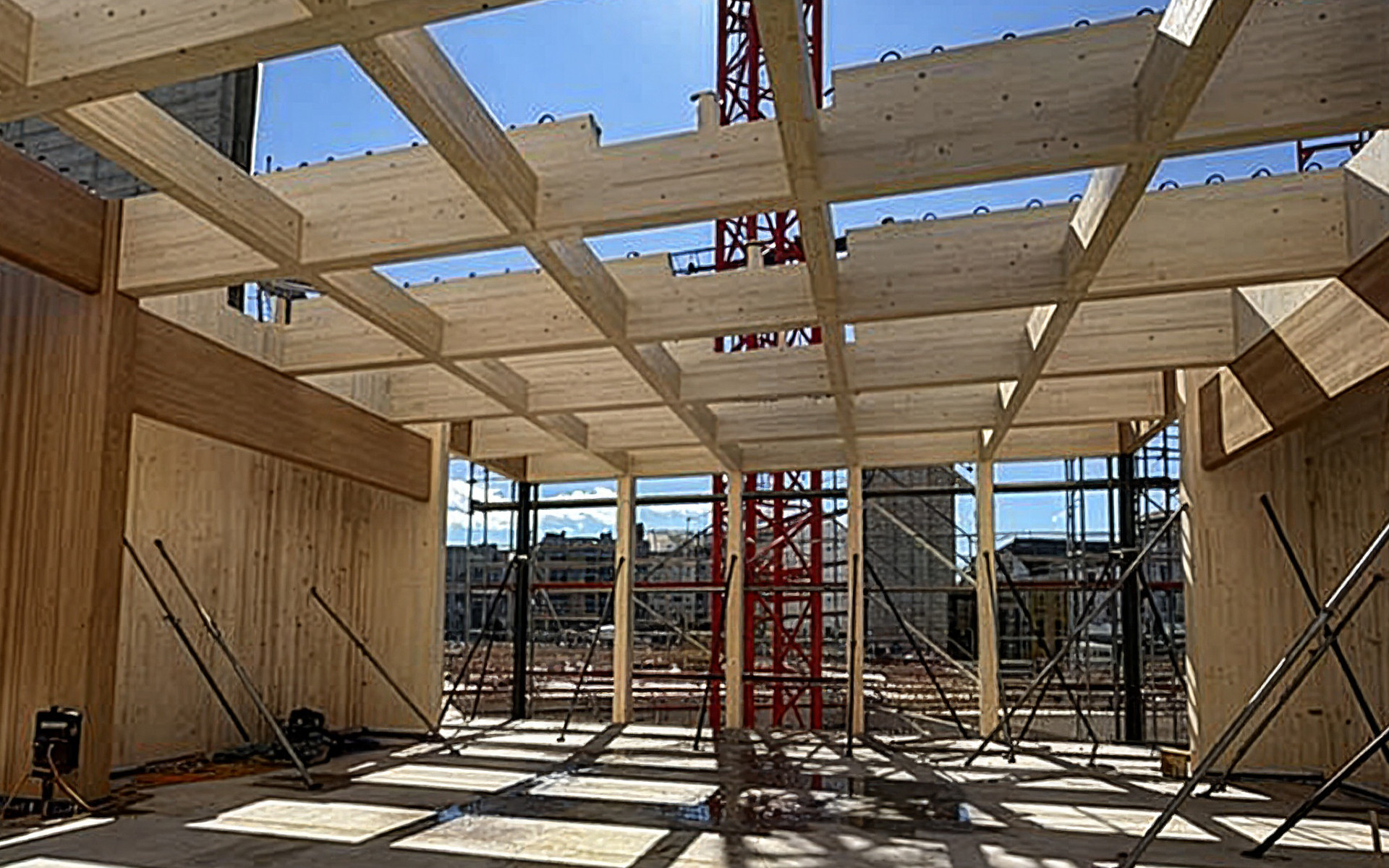 Post and beam engineered timber structure under construction with glulam beams and prefabricated system on construction site