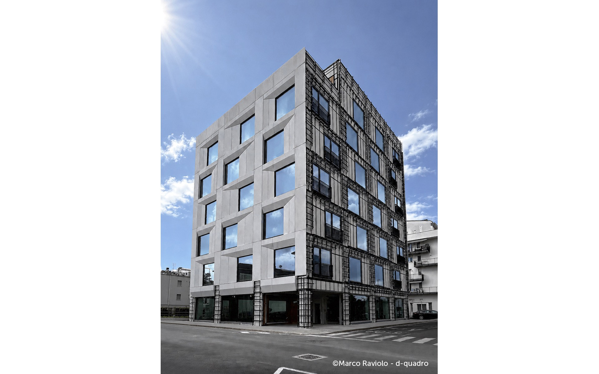 Prefabricated facade retrofit on existing building showing installation phases and building envelope transformation